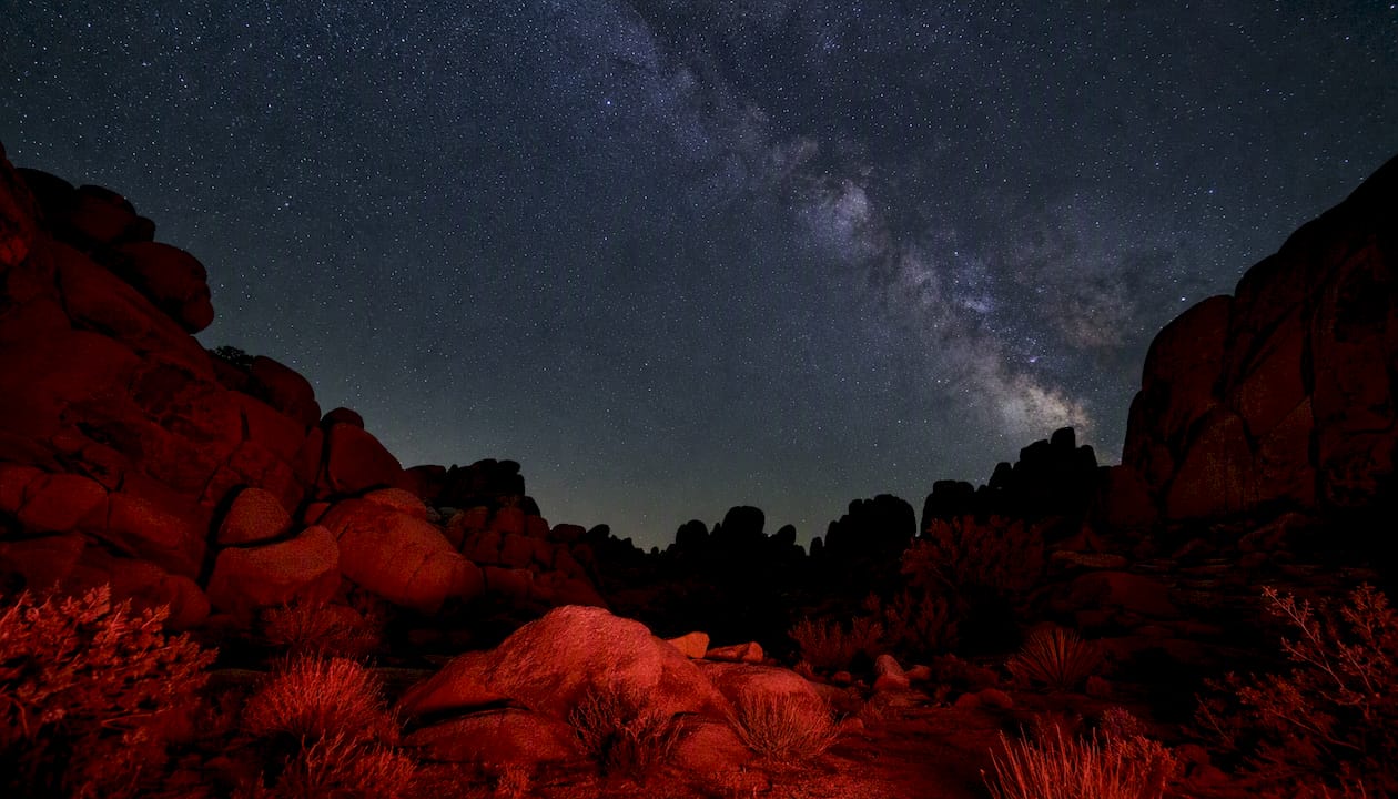 Boulders framing starry sky at Hidden Valley