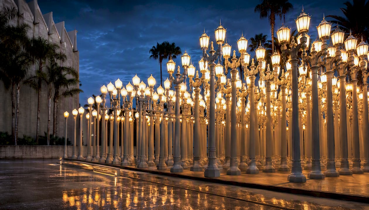 Illuminated Urban Light lamp columns at twilight