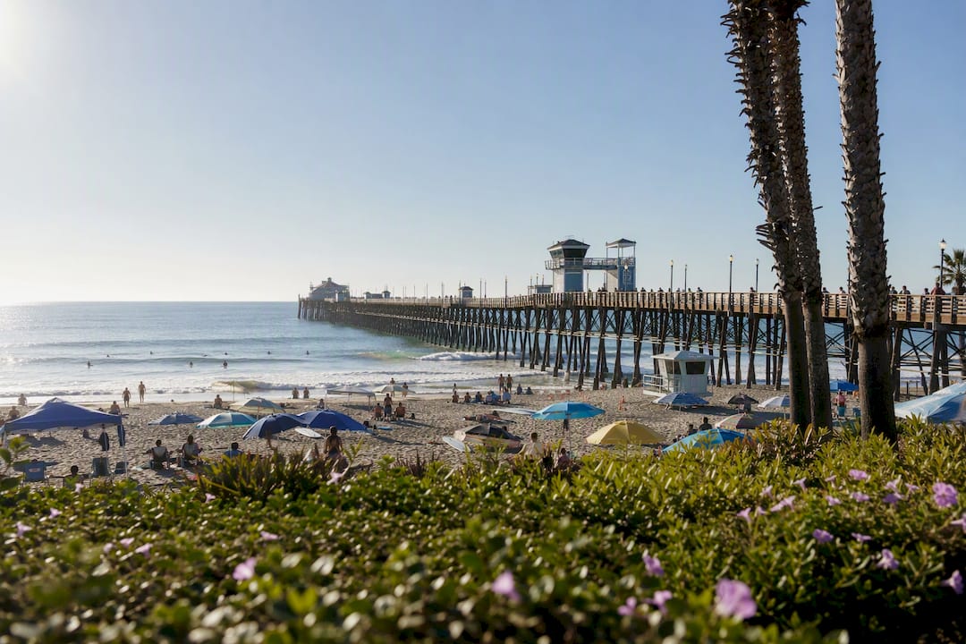 Oceanside wooden pier and beach scene