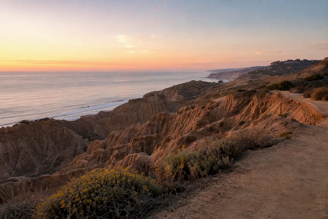 Sunrise lighting on sandstone cliffs at Torrey Pines