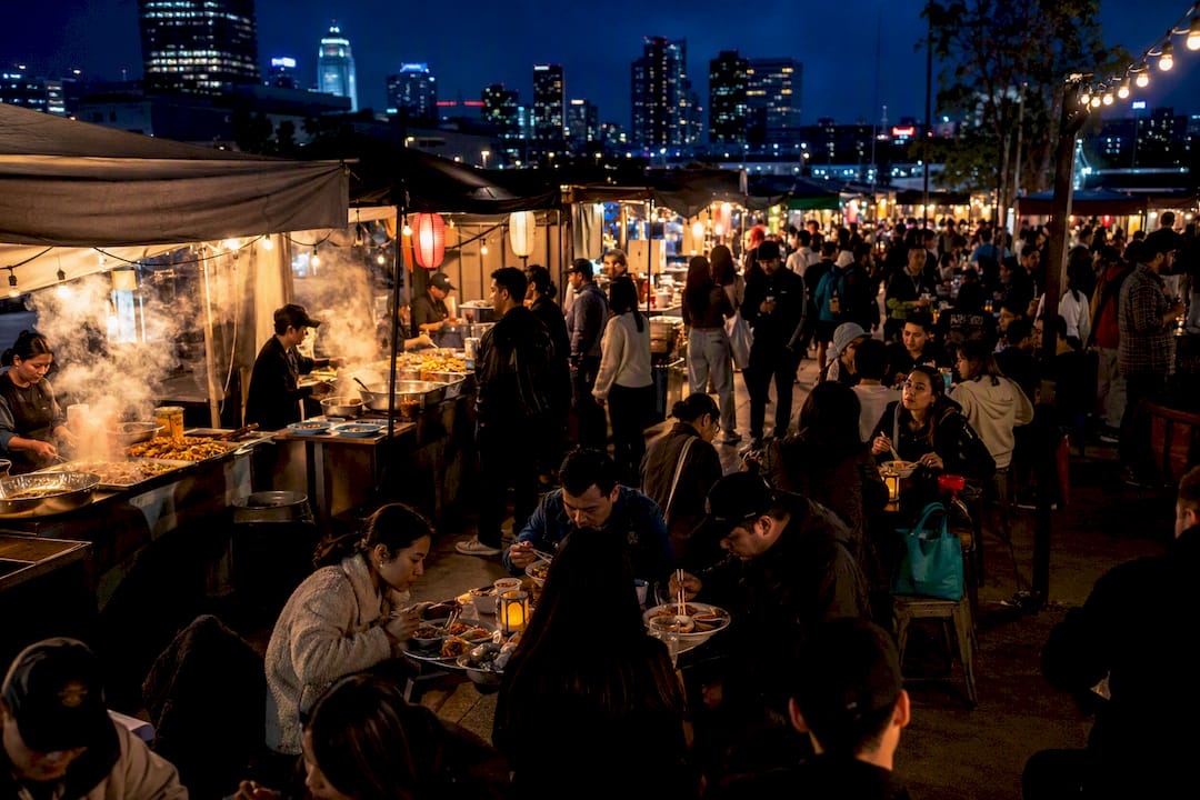 Crowded Los Angeles night market after dark