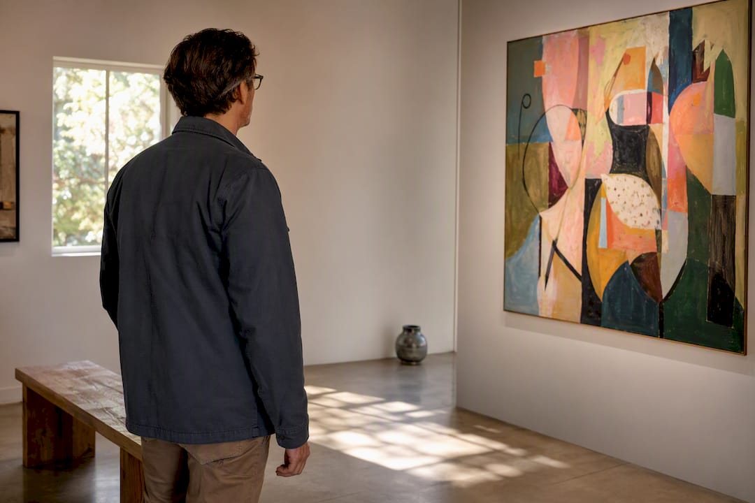 Visitor viewing artwork in an Ojai gallery