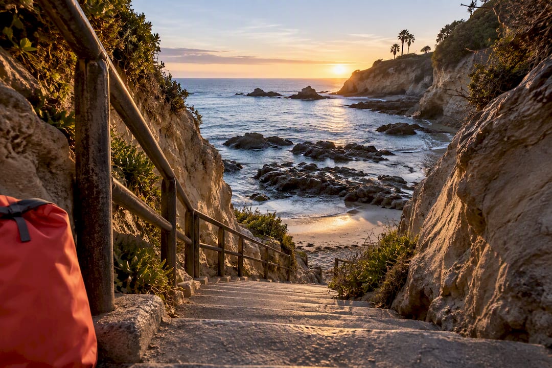 Sandstone stairs descending to a hidden Laguna cove