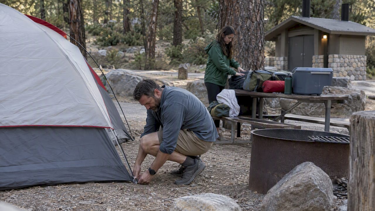 Family setting up Big Bear campsite