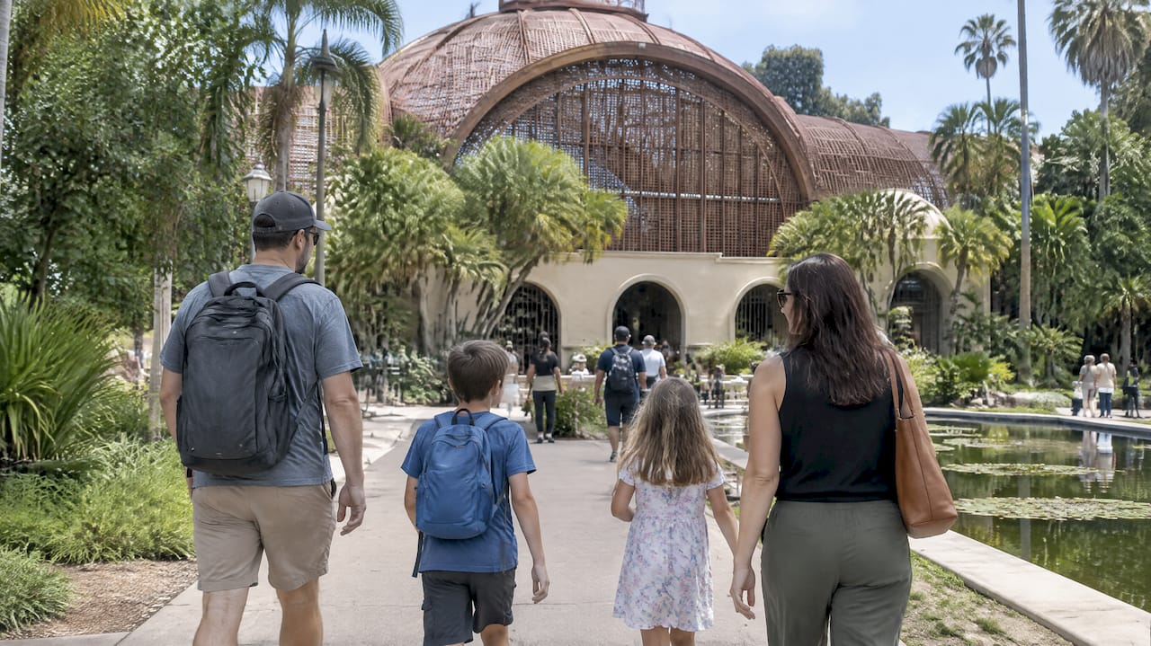 Family visiting Balboa Park Botanical Building
